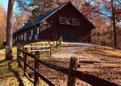 Embrace the beauty of nature. Our picturesque farm provides the perfect setting for a relaxed and romantic wedding. Our barn is shown among the fall leaves at our farm and wedding venue in Lynchburg, VA.