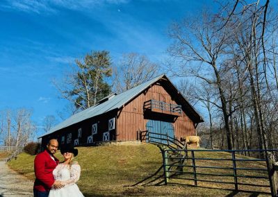 Bride and Groom pose for photos after their small barn wedding in Virginia.